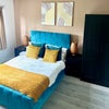 Photo 2: Typical Room style within the house. Designs may vary