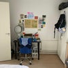 Photo 3: bedroom with provided desk and chair