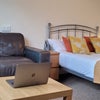 Photo 15: Comfortable sofa, two coffee tables