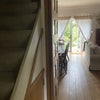 Photo 2: Entrance hall stairs to top floor