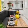 Photo 11: Communal Kitchen and Living Area