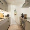 Photo 5: Shared fully equipped kitchen