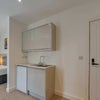 Photo 7: Private kitchenette/Fridge