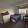 Photo 5: In-wall wardrobe to the left