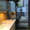 Photo 8: Kitchen doors to rear patio
