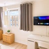 Photo 2: Wall-mounted TV Bedroom 3