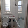 Photo 9: Shared bathroom