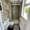 Photo 5: Shared shower (between 2: weekly clean)