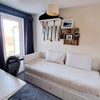 Photo 5: Ikea daybed is extra long and pulls out to Kingsize