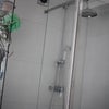 Photo 7: the bathroom/shower is quite bright and large