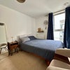 Photo 5: Main bedroom with super king bed, chest of drawers & wardrobe