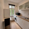 Photo 4: Kitchen- we just finished the renovation of the kitchen so it is brand new. 