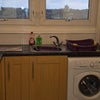 Photo 7: Kitchen with washing machine, dryer