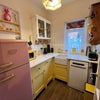 Photo 3: Private kitchette with fridge/freezer, microwave & dishwasher