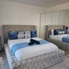 Photo 2: Bedroom One (Blue)