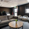 Photo 6: Lounge and gaming area