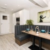 Photo 12: Communal Kitchen and Living Area