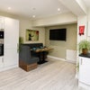 Photo 14: Communal Kitchen and Living Area