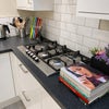 Photo 9: Communal Kitchen and Living Area