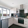 Photo 7: Spacious kitchen with oven, stovetop, fridge and dishwasher