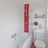 Photo 8: Bathroom (sink, mirror and storage behind photographer)