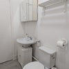 Photo 9: Main bathroom – sink and toilet