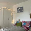 Photo 5: Doors open to built in wardrobe
