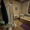 Photo 4: Bathroom with bath and brand new shower
