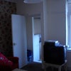 Photo 2: Part of the living room 