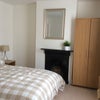Photo 2: Bedroom comes fully furnished