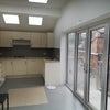 Photo 6: Bright and airy kitchen with large window 