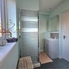 Photo 9: Bathroom and washing machine