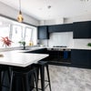 Photo 6: Communal Kitchen and Living Area