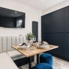 Photo 9: Communal Kitchen and Living Area