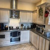 Photo 8: The kitchen