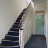 Photo 2: Large Communal Hallway and front door to flat