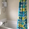 Photo 5: Upstairs Bath, Electric shower