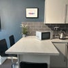 Photo 7: Countertop with stools