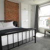Photo 3: Two large windows, built-in wardrobe, brick wall, lots of space and storage