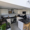 Photo 9: Kitchen (complete with XL cooker!)