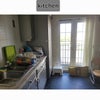 Photo 5: Shared kitchen (there should be a desk next to the windows)