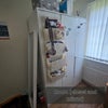 Photo 3: The closet (whatever is hanging from the closet door will be removed) and the mirror