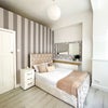 Photo 2: Room 1 second right