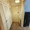 Photo 7: Hallway with storage