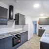 Photo 5: Another view of the kitchen area