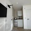 Photo 2: Private kitchenette with fridge freezer