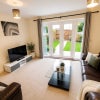 Photo 5: GF -  Communal Lounge area