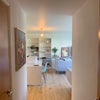 Photo 2: Corridor to lounge
