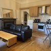Photo 4: Living Area (From Bedroom)