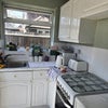 Photo 7: Bright shared kitchen with plenty of cupboard space